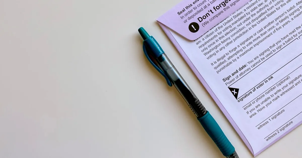 a pen sitting on top of a piece of paper